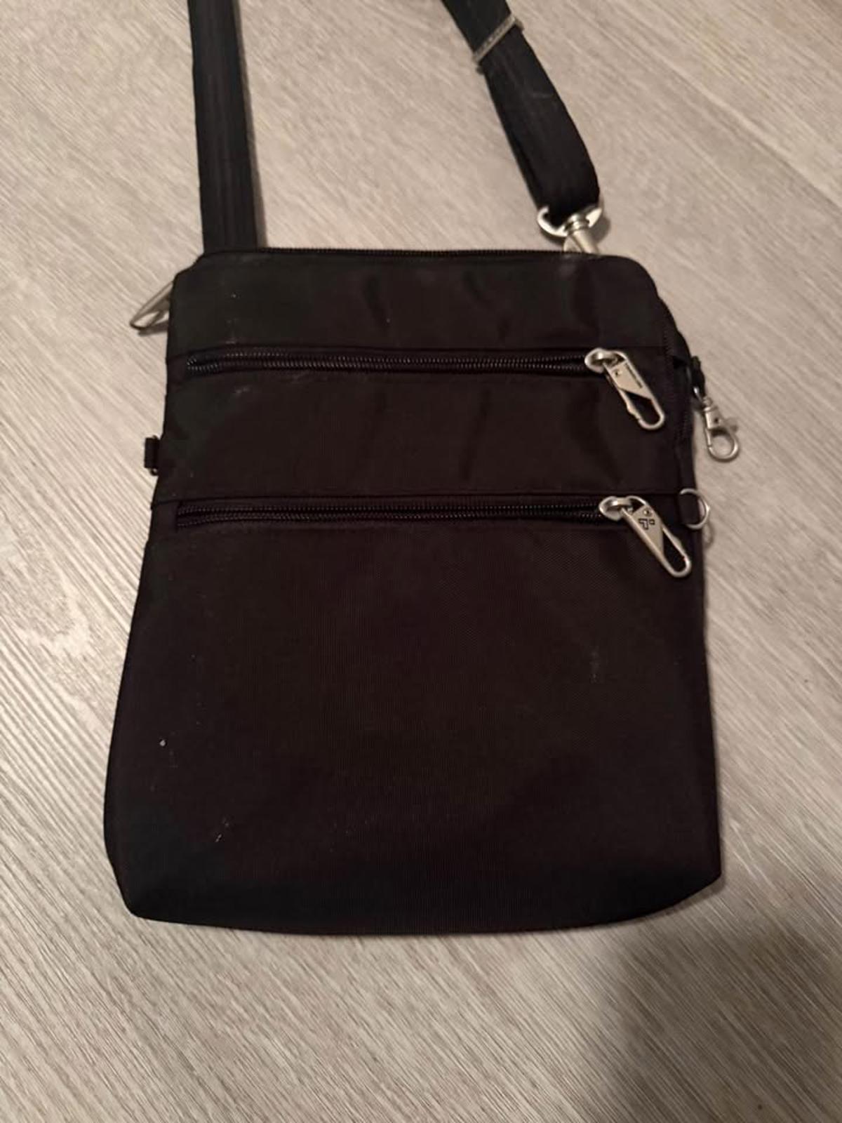 Travel cross body bag- all zippers lock